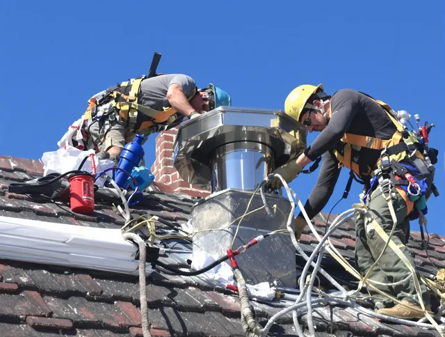 Protective chimney cap installed by Hudson Chimney Sweep in Hudson, MA