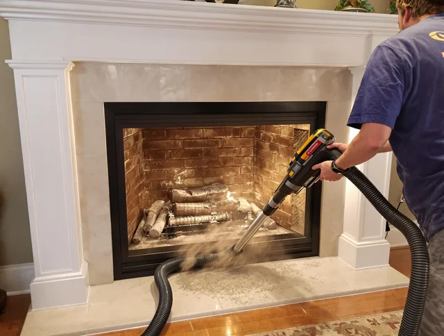 Fireplace cleaning performed by Hudson Chimney Sweep in Hudson, MA